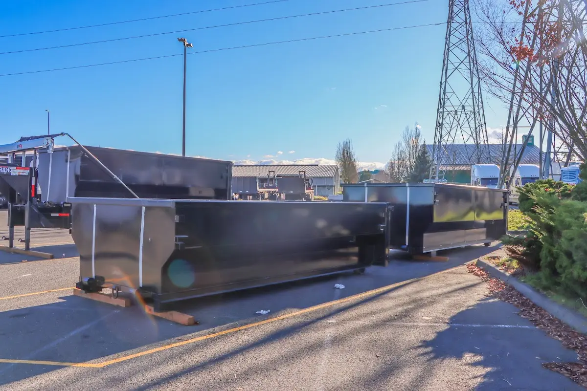 Roll-off dumpster ready for waste disposal at job site for Concrete Dumpster Rental in Mamaroneck